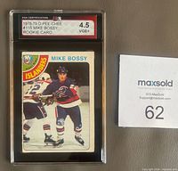 Front of graded Mike Bossy rookie card in KSA slab displaying grade 4.5 VGE+ and card image