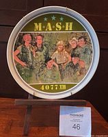 Front view of M*A*S*H plate on stand