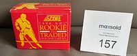 Front of red Score 1990 Rookie & Traded box beside lot card
