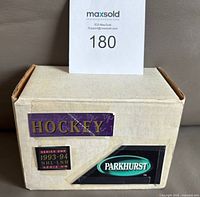Closed cardboard box with Parkhurst and Hockey stickers