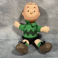 Front view of Charlie Brown plush doll
