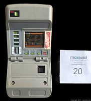 Tricorder open, front view showing control panel and screen
