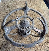 Top view of fully assembled Deep Space 9 model showing outer ring, habitat modules and docking pylons.