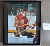 Front view of framed Dan Bouchard photo