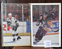 Both framed puzzles side by side