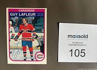 Front of 1982-83 O-Pee-Chee card #186 showing Guy Lafleur and autograph