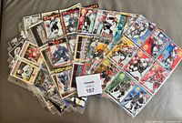 Stack of binder pages showing assorted 1990s NHL food-issue cards