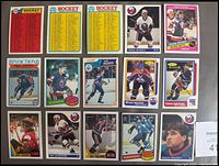 Front view showing all 15 O-Pee-Chee hockey cards in holders