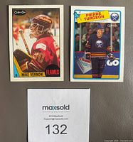 Close-up of Mike Vernon and Pierre Turgeon rookie cards