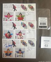 Three first day covers, plastic sleeve, paper slip with lot number