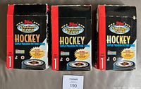 Three Topps Stadium Club Hockey Series 1 retail boxes front view