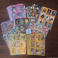 Overview of all binder pages showing multiple card designs and colours