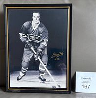 Framed signed photo, full view