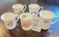 Group shot of all five floral bone china mugs