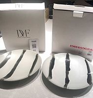 Front view of both Mashiko platters with original DVF boxes