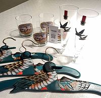 overview of all items: 4 tumblers, 3 duck hangers, 2 CHE flutes