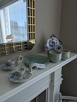 Mantel view with all ceramic items