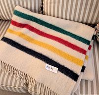Folded Hudson's Bay Caribou throw showing stripe pattern and fringe