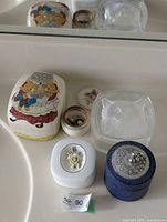 Group of trinket boxes on counter