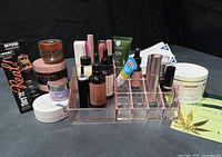 Full assortment showing organizer, mascara box, jars, serums, body butter, mask