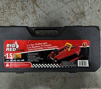 Front of carry case showing Torin Big Red label with specs