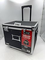 Full view of chest closed with telescoping handle extended and label visible