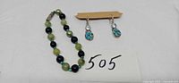 Bracelet, earrings pair, lot number visible