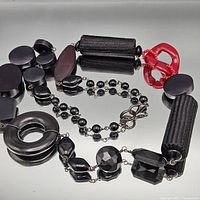 Full view of necklace showing bead shapes and colors