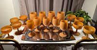 Full set of 17 frosted glasses on tray showing overall condition and color