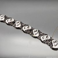 Full view of sterling silver enamel horse motif bracelet