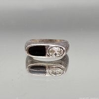 Front view of ring showing two black onyx stones and sterling silver setting