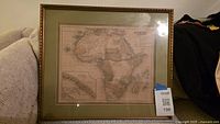 Front view of framed map showing entire piece