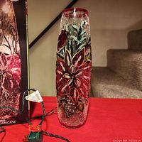 Full view of vase with cord and partial box