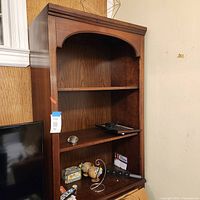 Full view showing open shelves above and cabinet doors below