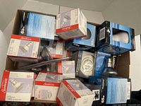 Box of assorted boxed light bulbs