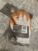Packaged pair of HexArmor gloves showing front label and barcode