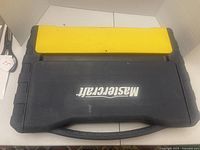 Closed Mastercraft case with yellow latch