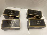 Four black boxes labeled 5 Picture Lamp