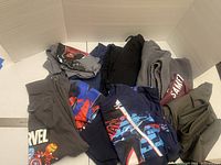 All seven garments laid out together