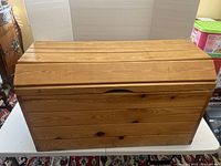 Closed view of solid pine storage chest trunk