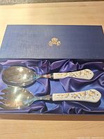 Salad spoon and fork in satin-lined box