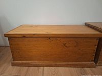 Front and top of pine blanket box