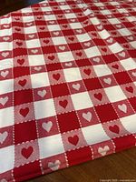 Close-up of tablecloth showing heart check pattern and fabric texture