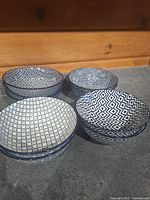 Group of bowls showing four geometric patterns