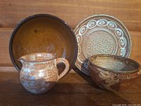 Group view of all four pottery pieces