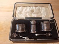 Complete sterling condiment set in original case