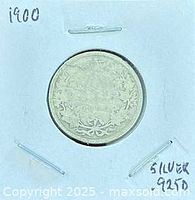 Reverse side of 1900 Canadian 25-cent coin in cardboard flip