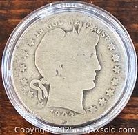 Obverse of 1903-O Barber Half Dollar in holder