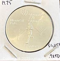 Reverse with marathon runner, Olympic emblem, denomination and year