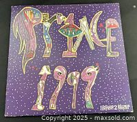 Front of outer jacket displaying album title artwork